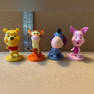 Set of four Kelloggs Winnie the Pooh Nodders